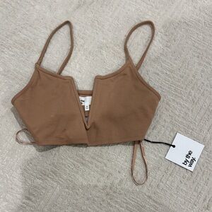 XXS brand new with tags by the way. Tan bralette